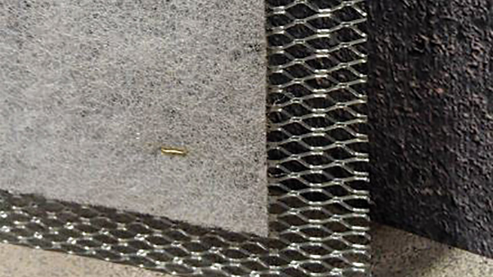Shown is an image of combined wire lath and drainage mesh all in one.
