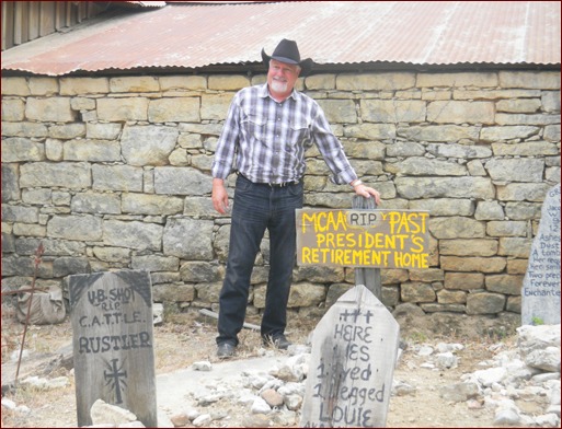 Tom Daniel, past-president of MCAA, stands next to the MCAA Past-President’s retirement home.