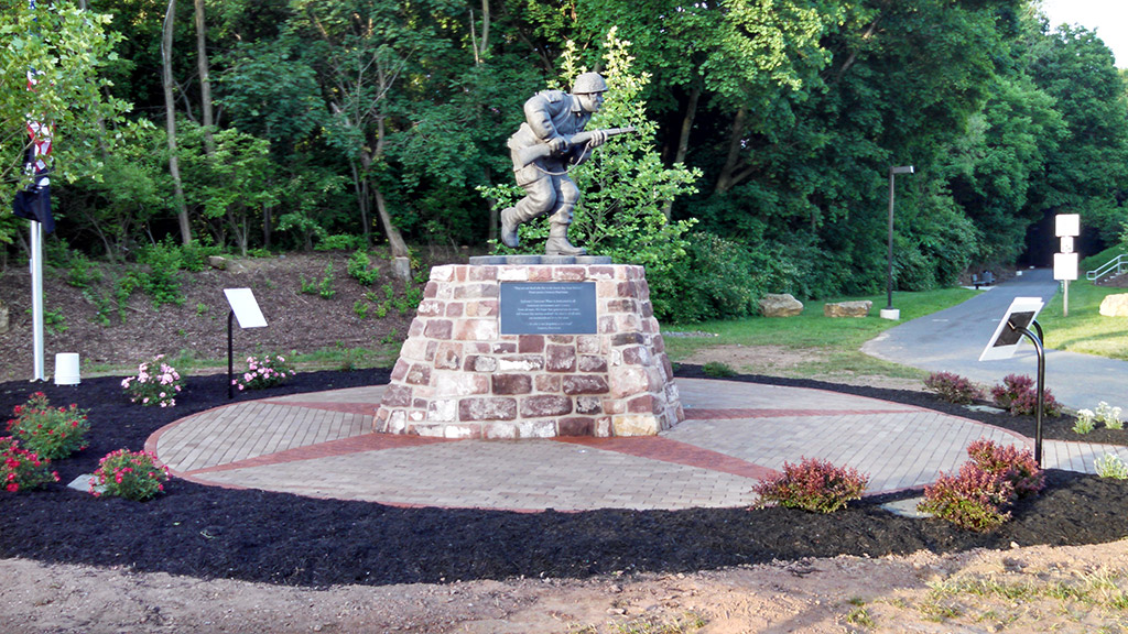 The centerpiece of the plaza is a statue of one of World War II’s best known soldiers, Major Richard D. Winters.