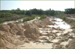 Settling pond dredged for recycled material