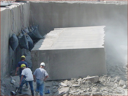 Once Limestone block is sawn, compressed air bags inflate to force the 12-ton block onto its side in preparation for extraction from this Indiana Limestone Co. quarry. Photo ??2010 Indiana Limestone Company/MyersCroxton Group.
