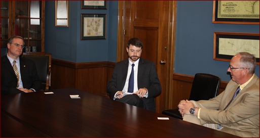 Senator Mark Pryor (left), Congressional aide, and Paul Odom (right).