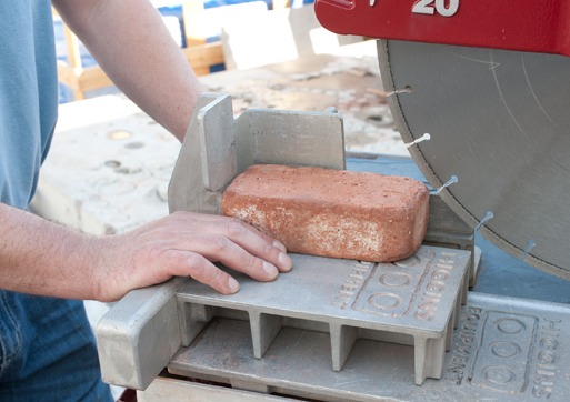 A more controlled cut is allowed, by preventing the blade from running up the brick.