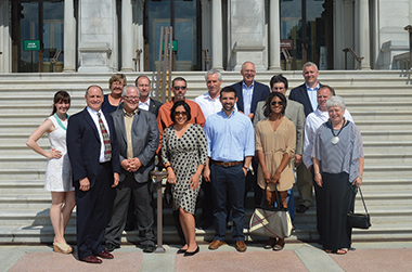 Attendees of the South of 40 Conference are shown on the steps of the Library of Congress. 