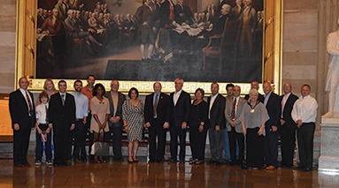 Attendees of the South of 40 Conference are shown with Congressman Reid Ribble (R-WI).