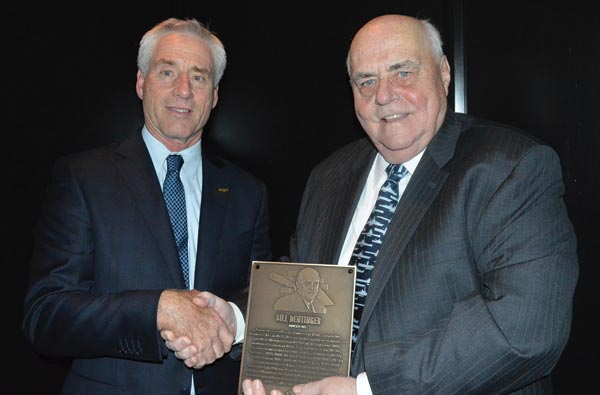 MCAA Chairman Mark Kemp (left) inducts Bill Dentinger into the 2015 Masonry Hall of Fame during the 2015 MCAA Closing Banquet.