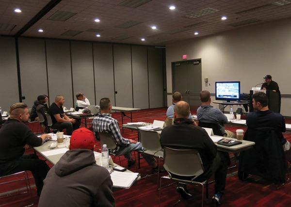 Attendees listen as Dave Jaykins leads the Foreman Development Course.