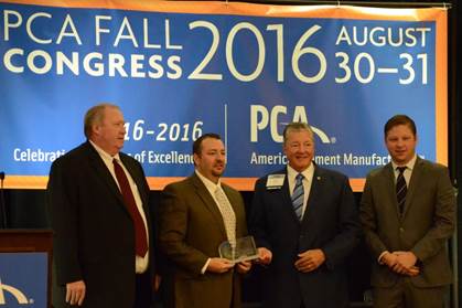 Scott Nielson, second from left, Ash Grove Cement corporate environmental manager, was the winner of PCA’s 2016 John P. Gleason Jr. Leadership Award. Others pictured, left to right, John Stull, PCA board chair and president and CEO – United States of LafargeHolcim; Jim Toscas, PCA president and CEO; Colin Gleason, son of John P. Gleason Jr.